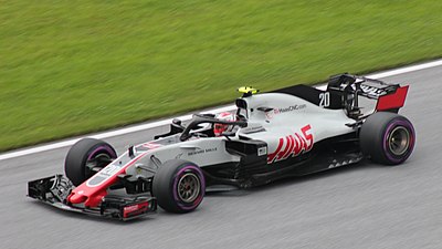 What motorsport does Kevin Magnussen compete in?