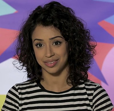 When did Liza Koshy become a correspondent for TRL?
