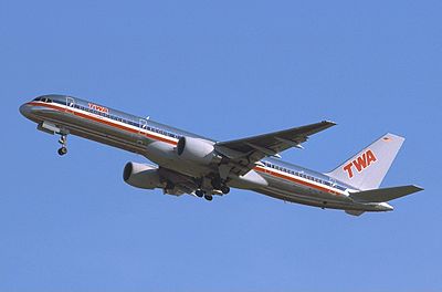 Which aircraft did TWA initially operate with on its route from New York City to Los Angeles?