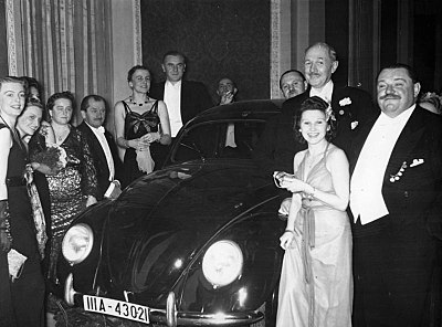 What was Ferdinand Porsche's first hybrid vehicle called?
