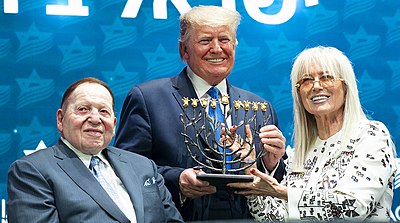 Which honor did Donald Trump bestow upon Miriam Adelson?