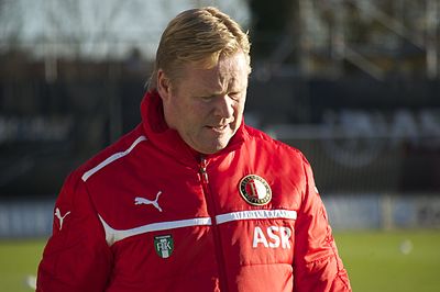 How many consecutive Eredivisie titles did Koeman win with PSV?