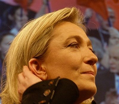 What is Marine Le Pen's native language?
