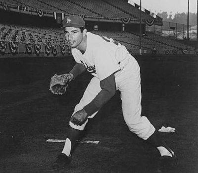 What year did Sandy Koufax retire from professional baseball?