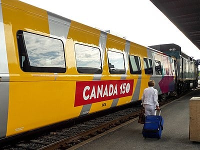 What is the primary language used on Via Rail trains?