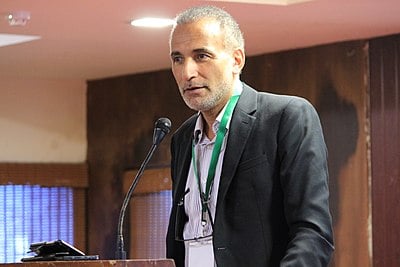 In which Japanese university did Tariq Ramadan hold a research fellowship?