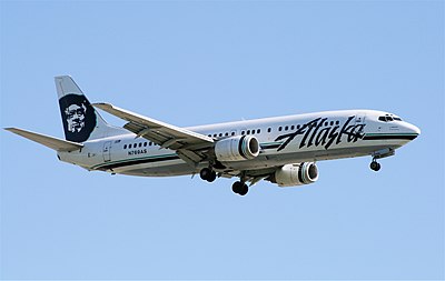 In which year did Alaska Airlines join the Oneworld alliance?
