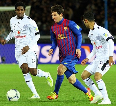 Do you know in what league Lionel Messi played during the time period between 2004 and 2021?