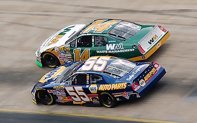 Which team joined Michael Waltrip Racing in using Toyota Camrys in 2008?