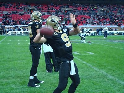 Who holds the record for the most passing yards in a single season for the Saints?