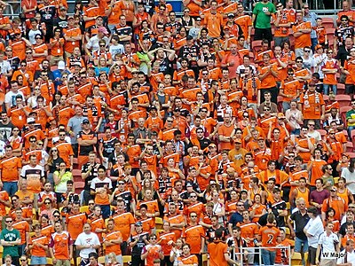 Which club does Brisbane Roar FC share its history with?