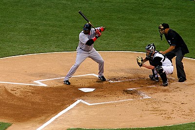 Which division series did Ortiz clinch with a walk-off homer in 2004?