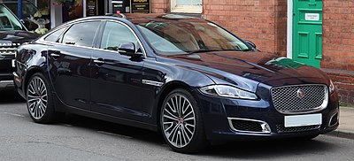 Which British Prime Minister received an XJ (X351) as their official car in May 2010?