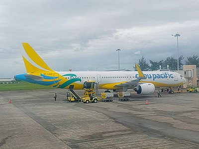 In 2010, Cebu Pacific overtook which rival airline in terms of passenger numbers?
