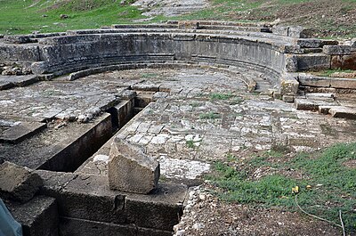 What was the primary language spoken by the inhabitants of Oricum during the Roman period?