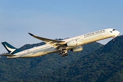 In 2018, what was Cathay Pacific's rank among the largest airline groups in the world by traffic?