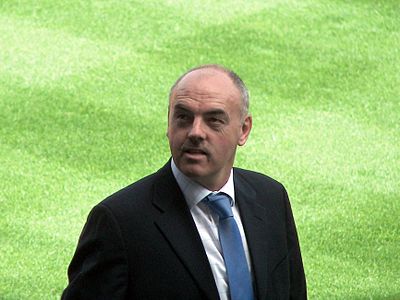 Which position did John Wark occasionally play besides midfielder?