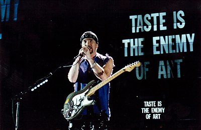 Which genre has influenced The Edge's guitar style?