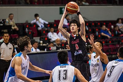 Which medal did Yuta help the Japan national team win at the 2013 East Asia Basketball Championship?