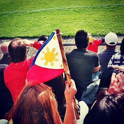 When did the Philippines national football team play their first international match?