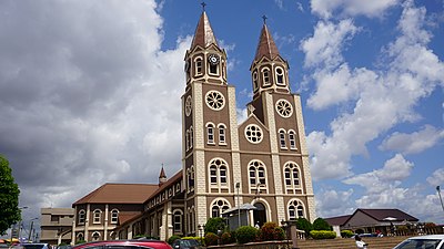 What is another name for Kumasi due to its past abundance of flowers and plants?