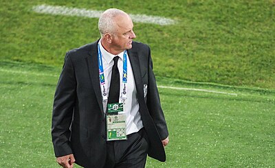 What is the highest FIFA World Cup round that Australia has achieved under Arnold's management?
