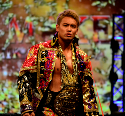 Which championship did Okada hold twice after it was unified into the IWGP World Heavyweight Championship?