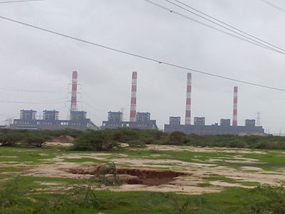 What is the primary source of energy for Adani Group's power generation business?