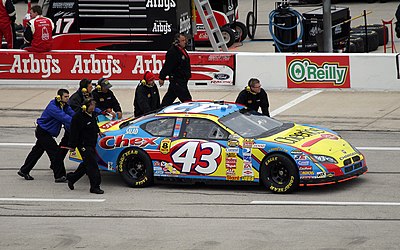 For which Tour is Bobby Labonte currently racing part-time?