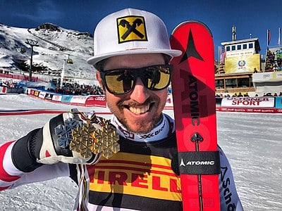 Marcel Hirscher primarily competed in which skiing disciplines?