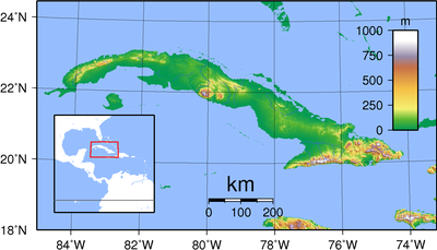 What is the name of the highest point in Cuba, which is [NOT FOUND IN JSON] above sea level?