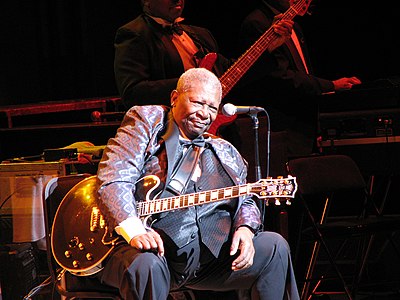 Which British rock band did B.B. King collaborate with on the album "Riding with the King"?
