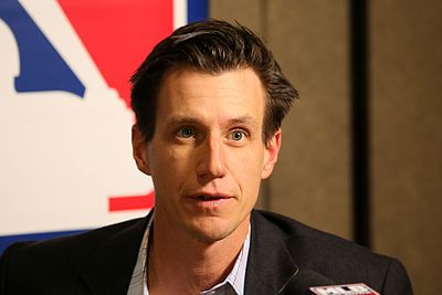 In what sport was Craig Counsell a professional player?