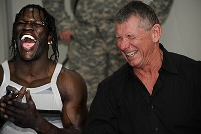 In which year did Vince McMahon retire from WWE?