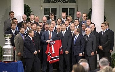 What division do the New Jersey Devils compete in within the NHL?