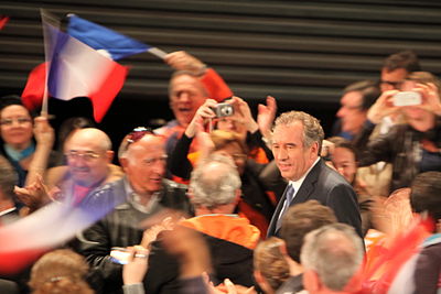 In which year did Bayrou support Emmanuel Macron?