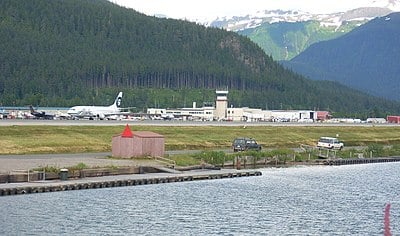 What is the height of the mountains surrounding downtown Juneau?
