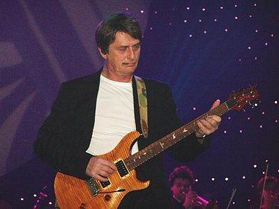 What genre is NOT associated with Mike Oldfield?