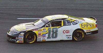What type of car does Alex Tagliani currently race?