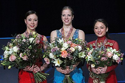 In which year did Carolina Kostner win a medal in every competition she entered?
