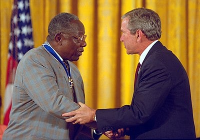 What position did Hank Aaron hold with the Atlanta Braves after retirement?