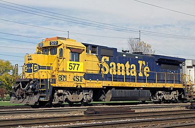 When did the merger of the Atchison, Topeka and Santa Fe Railway and Burlington Northern Railroad take place?