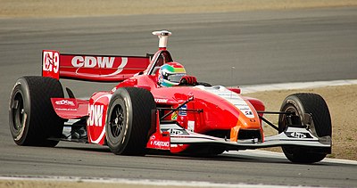 Who did Justin Wilson drive for in the 2003 Formula One season?