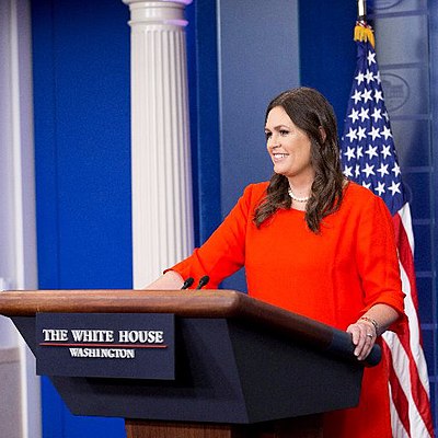 What was the frequency of press conferences held by Sarah Huckabee Sanders compared to her predecessors?