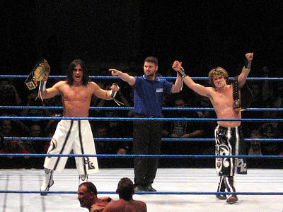 In which Japanese promotion did Kendrick win the NWA International Lightweight Tag Team Championship?