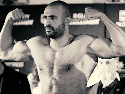 Badr Hari has a signature line, saying he's not a fighter but a..?