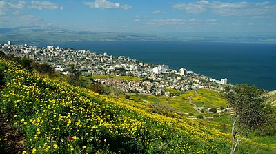 Which sea is Tiberias located on the western shore of?