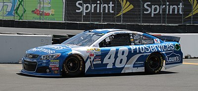 What type of vehicle did Jimmie Johnson race before transitioning to stock cars?