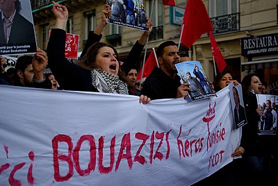 Who referred to Bouazizi and several others as "heroic martyrs of a new North African and Middle Eastern revolution"?