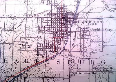 What is the population of the surrounding Harrisburg Township, including city residents?